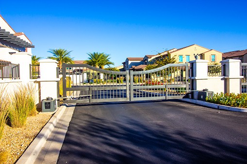 Metal Exit Gates Operated By Electric Motors And Arms